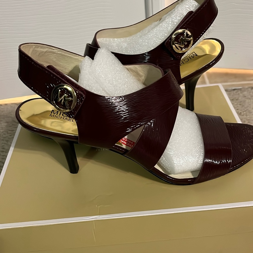 Michael Kors women’s high heel open-toe shoe.